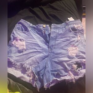 ripped light blue shorts